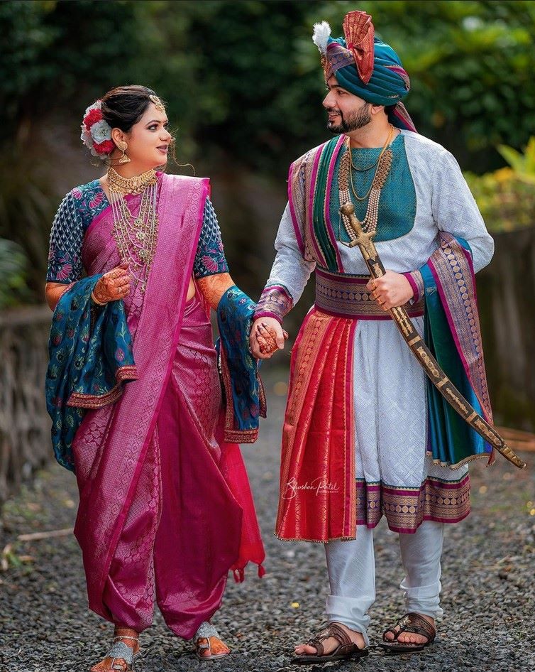 image of maharashtrian bride in simple pink and blue paithani saree with shela