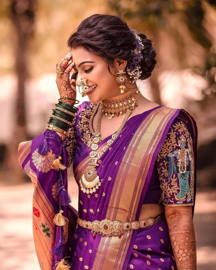 marathi bride wearing purple paithani saree with intricate blouse