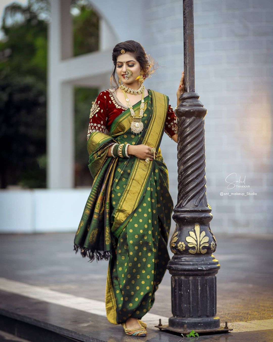 green wedding nauvari saree with maroon velvet blouse design