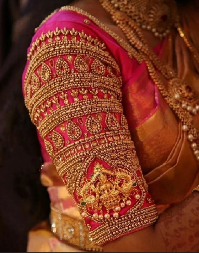 grand pink colour bridal blouse sleeve with temple work