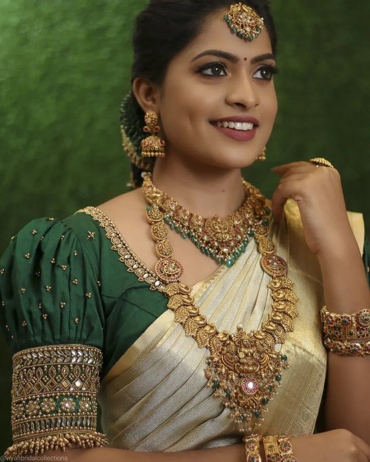 latest and traditional green puff sleeve blouse for silk saree