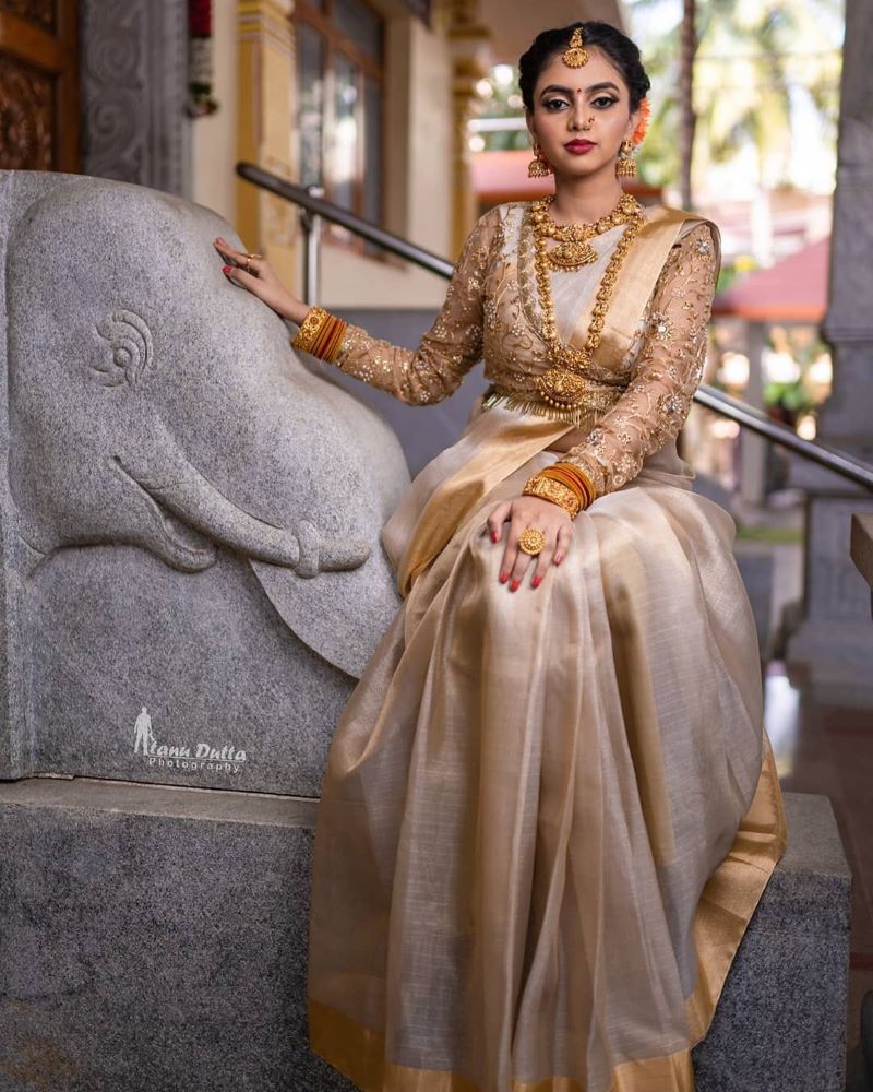 simple and minimal bridal full sleeve blouse for kerala bride