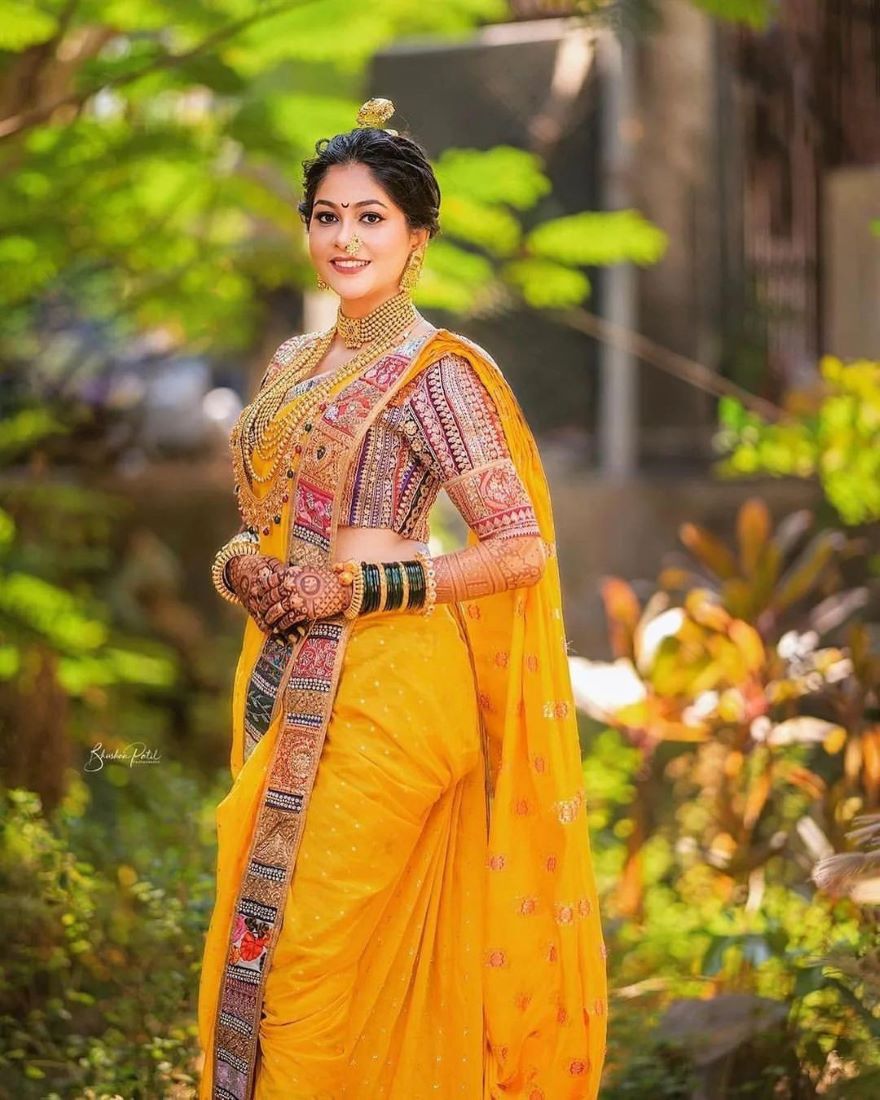 mango yellow nauvari saree look for maharashtrian wedding