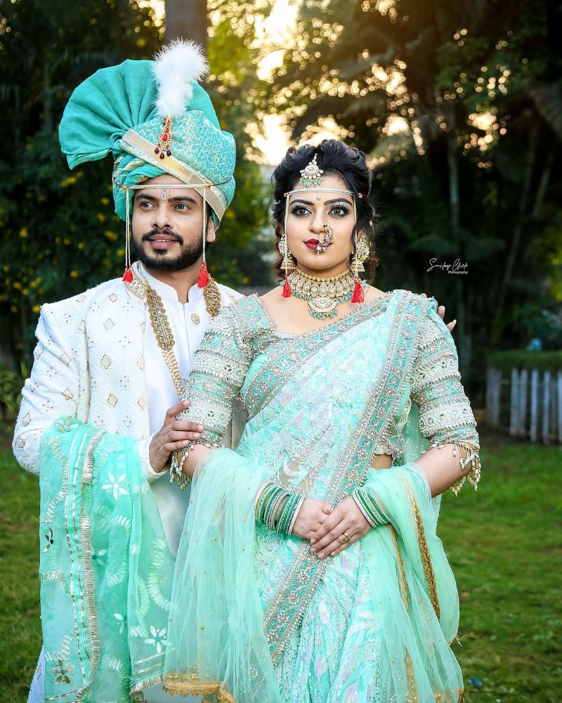unique and modern mint green nauvari saree for marathi brides