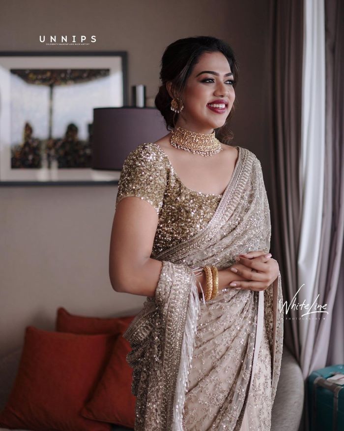royal kerala bridal reception look in sequin saree