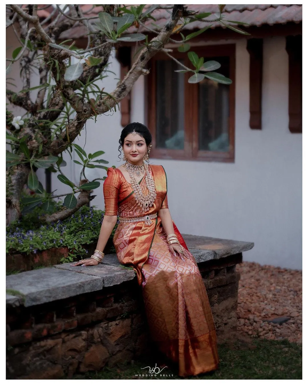 kerala bridal look indian featuring copper saree and diamond jewellery