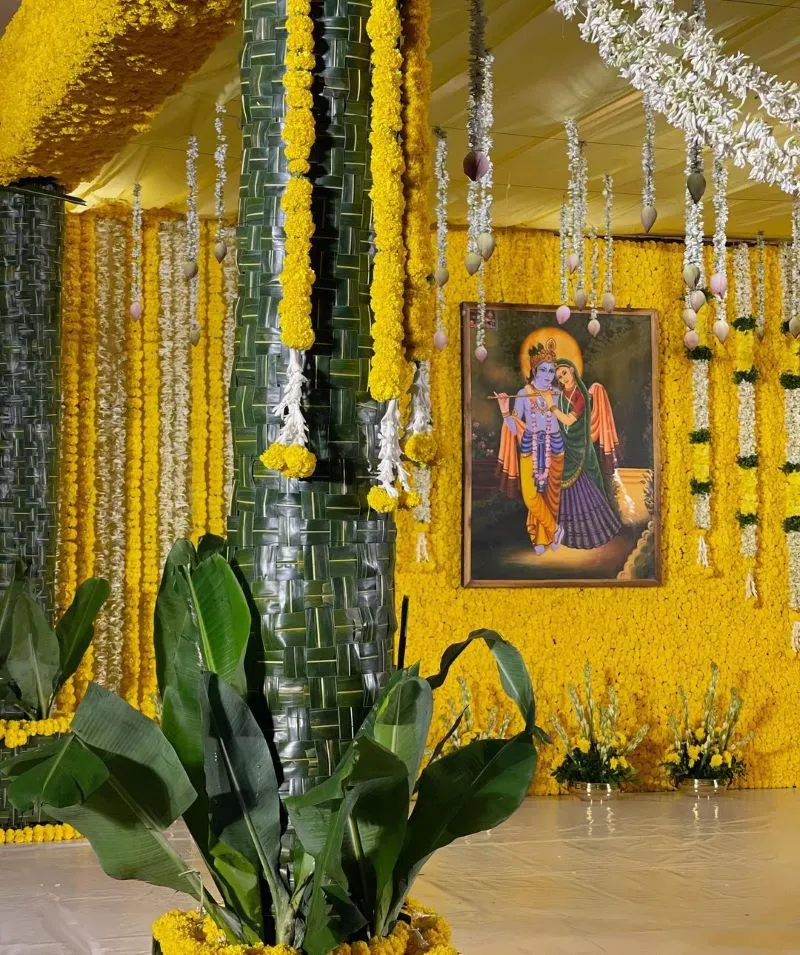 traditional engagement decoration ideas at home with marigold and banana leaves 