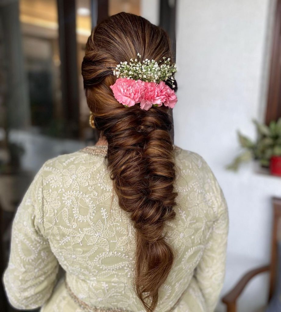 fishtail braid hairstyle with flowers