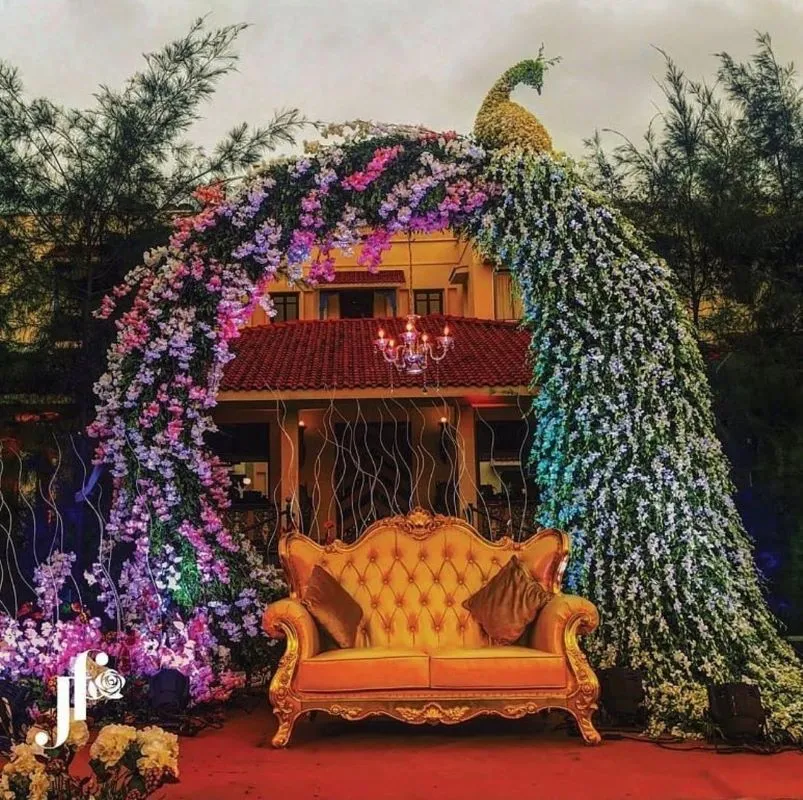 peacock floral arch backdrop for engagement