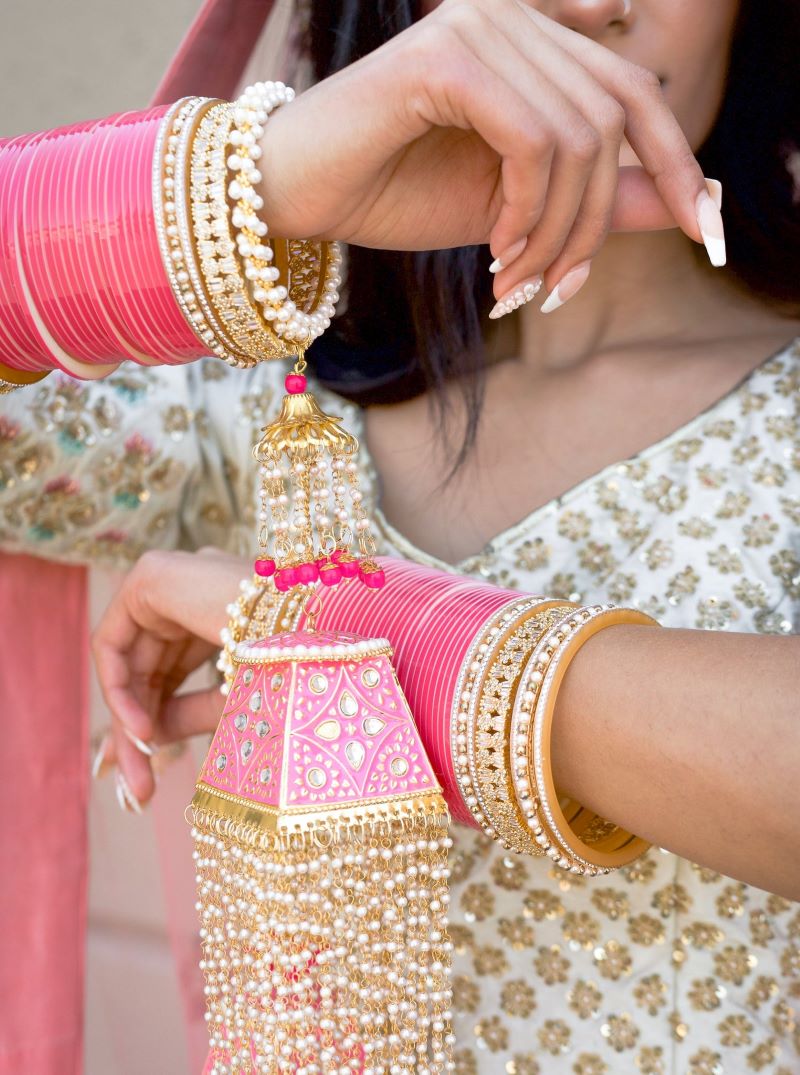 latest trendy pink bridal chura design with pearl kaleere