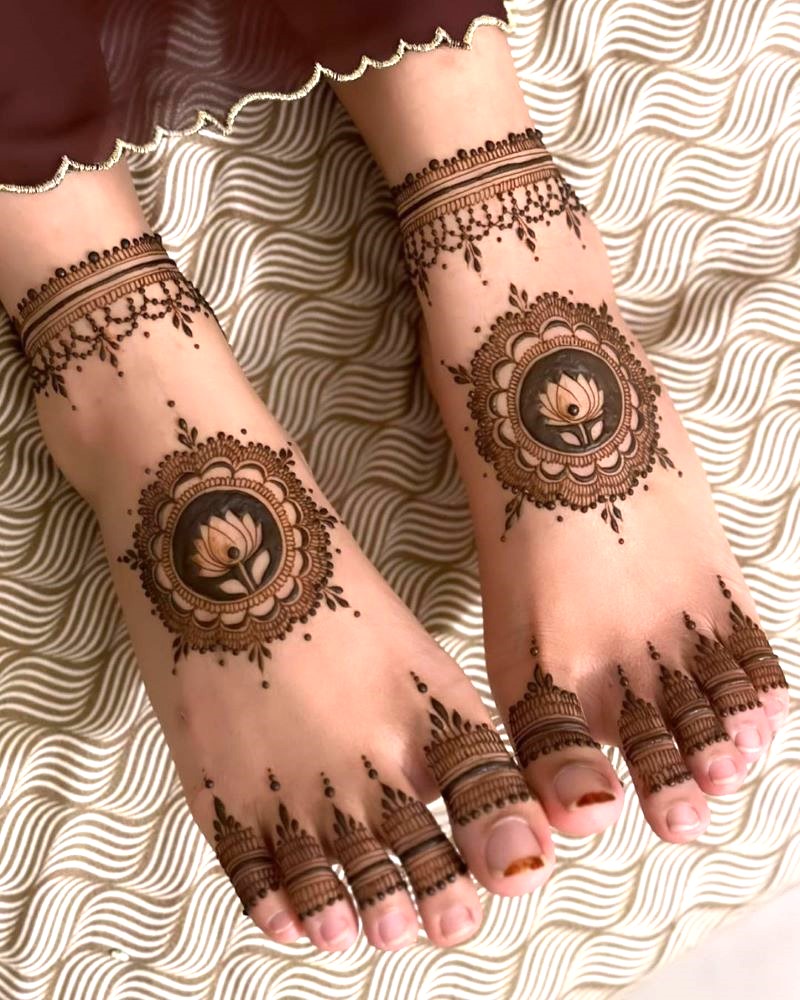 mandala mehndi design for leg with lotus flowers