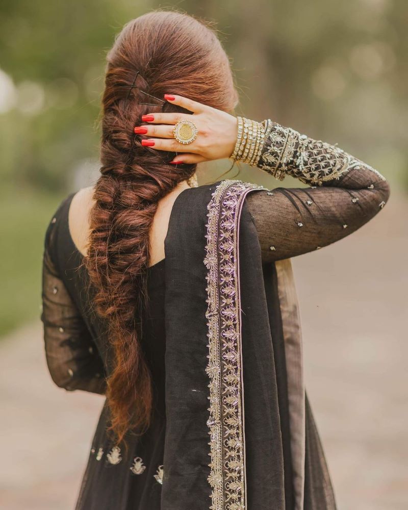 messy fishtail braid hairstyle for pakistani bride