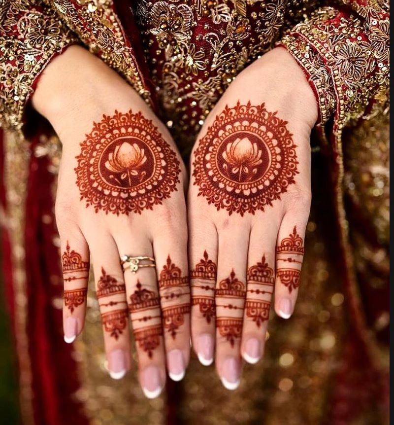 mandala mehandi with lotus flower for back hand