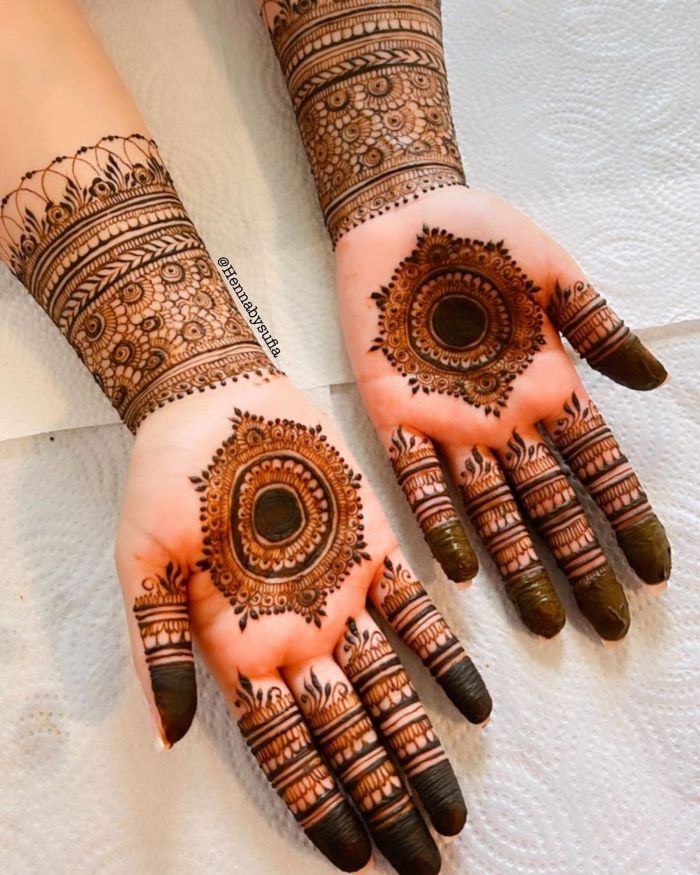 modern mandala mehendi with tikki and swirls