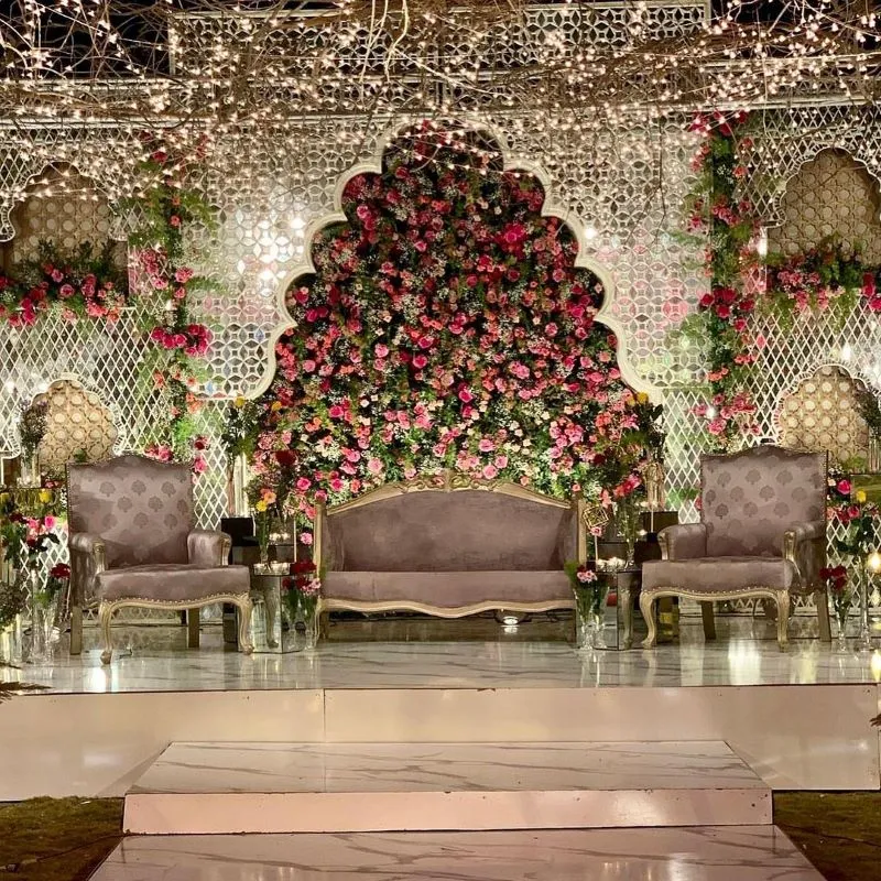 rose backdrop for engagement stage